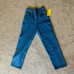 Jeans with embroidered Christmas gifts/presents and mistletoe